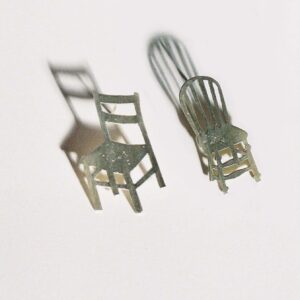 Tour Ready Jewelry combo: Kitchen + Attic models. Two different chair earrings on white background.