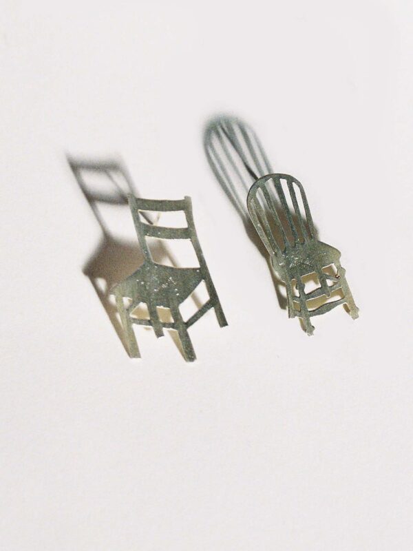Tour Ready Jewelry combo: Kitchen + Attic models. Two different chair earrings on white background.
